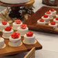 mini cake dessert bar with red roses