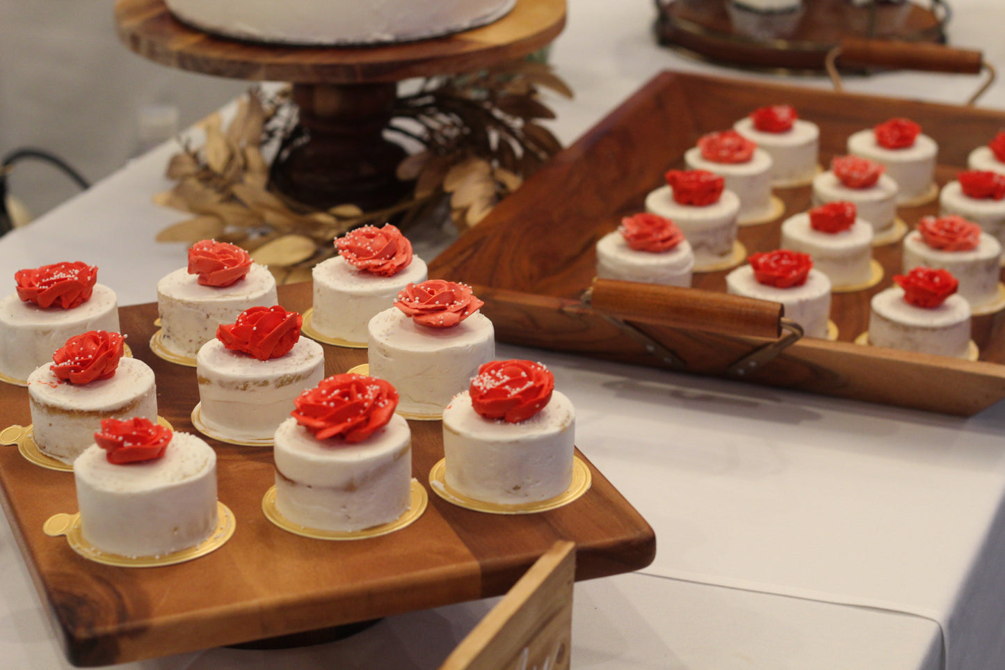 mini cake dessert bar with red roses